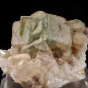 Fluorite - zoned crystals on Quartz