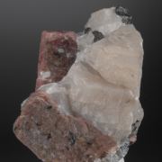 Rhodonite on Calcite with Franklinite