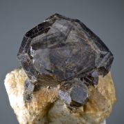 Spessartine on Orthoclase 