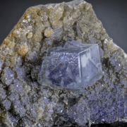 Fluorite (phantom) on Muscovite etc.