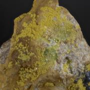 Parsonite with minor Torbernite, Dewindtite?  etc.