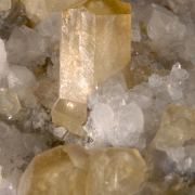 Calcite -Pineapple habit, on Quartz with Fluorite and Dolomite