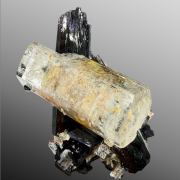 Beryl var. goshenite, tourmaline