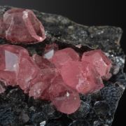 Rhodochrosite on Fluorite with Goethite