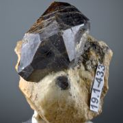 Spessartine on Orthoclase 