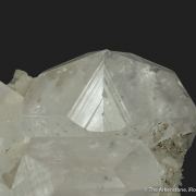 Calcite (fluorescent) on Quartz