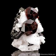 Spessartine Garnet and Schorl on Albite