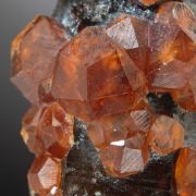 Spessartine on Smoky Quartz