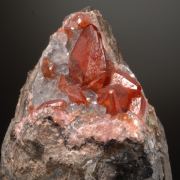 Rhodochrosite -Scalenohedral crystals on Quartz
