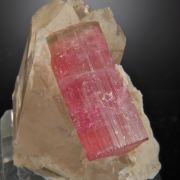 Ebaite (Rubellite) on Quartz