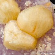 Calcite on Amethyst