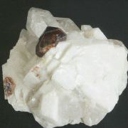 Spessartine with Quartz on Microcline