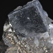 Bismuthinite inside Fluorite on Arsenopyrite