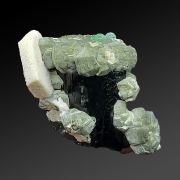 Fluorite, muscovite, tourmaline, feldspar