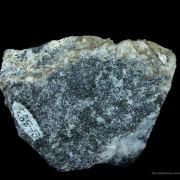 Tinzenite (Tl) in Calcite and Hematite