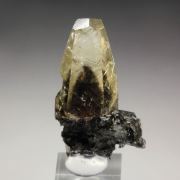 CALCITE with bitumen inclusions