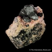 Hibonite in matrix