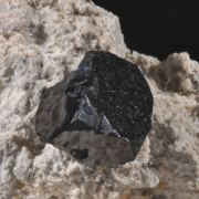 Bixbyite, Pseudobrookite & Topaz