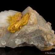 Wakabayashilite on Calcite