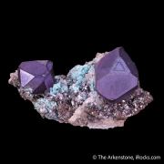 Cuprite on Calcite with Rosasite