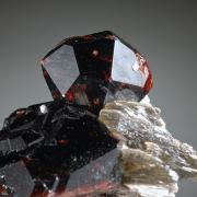 Spessartine on Muscovite