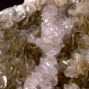 Apatite (Fluorapatite) on Muscovite with Calcite