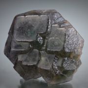 Fluorite- Modified cubes included by Foitite