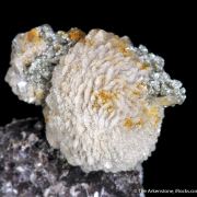 Stokesite with Cookeite on Lepidolite (illustrated)