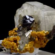 Cassiterite, apatite, arsenopiryte, quartz, siderite