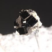 Bixbyite on Hematite (pseudo. Garnet)