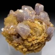 Herderite on Siderite
