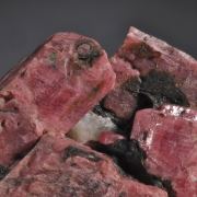 Rhodonite (blocky crystals with minor Franklinite, Calcite)