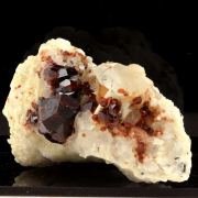 Spessartine Garnet, Orthose, Quartz.