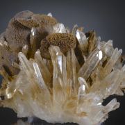Siderite (pseudomorphing to Limonite) on Quartz