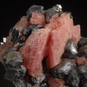 Rhodochrosite on Galena and Acanthite with Fluorite