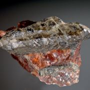 Enstatite (doubly terminated) on Almandine 