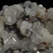 Smithsonite on Cerussite - rhomb habit crystals