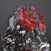 Rhodonite (doubly terminated crystal included by Galena)