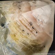 Dumortierite, Hematite (?) in Quartz