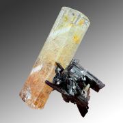 Beryl var. goshenite, tourmaline