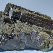 Fluorapatite with Ferberite, Siderite and Muscovite