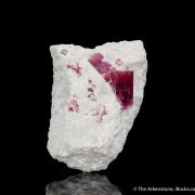 Beryl var. Red Beryl on Rhyolite