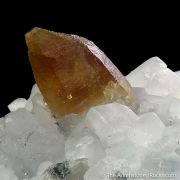 Beryl var. Emerald and Parisite-(Ce) on Calcite