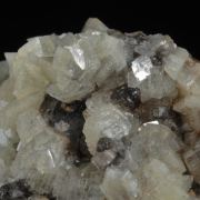 Smithsonite on Cerussite - rhomb habit crystals