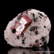 Rhodonite with Franklinite in Calcite