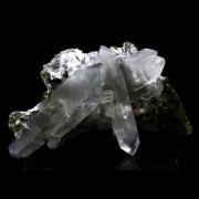 Quartz with Byssolite inclusions + Epidote.