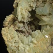 Phosphophyllite - crystals in fossil clamshell cast.