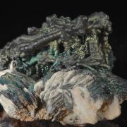 Psilomelane - iridescent, on Barite