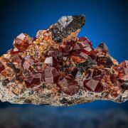 Spessartine  on Smoky Quartz