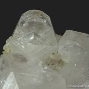 Calcite (fluorescent) on Quartz